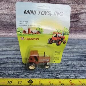 Vtg Mini Toys 1/64 scale Hesston 130-90 DT die-cast/plastic 4wd tractor brown